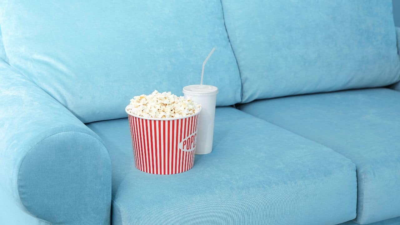 popcorn-and-drink-on-sofa